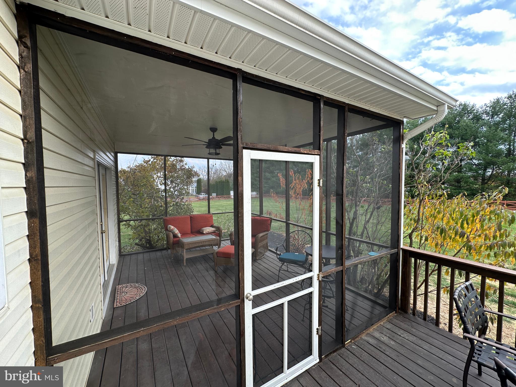 201 Vista Lane White Post, VA 22663 - Photo 15 of 61 a view of a balcony with floor to ceiling window wooden floor