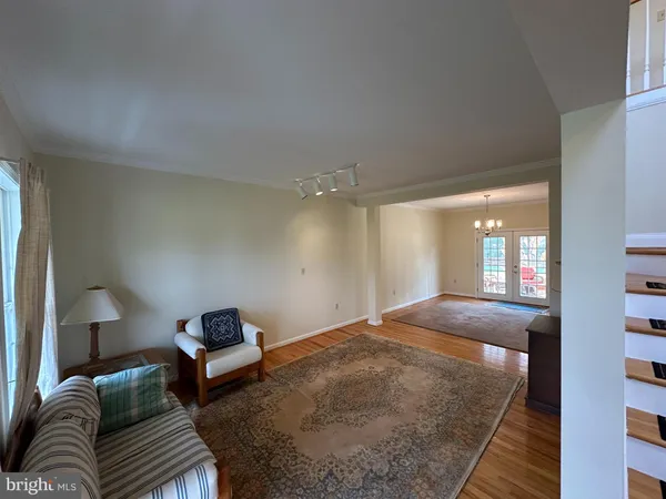 a room with storage and a refrigerator