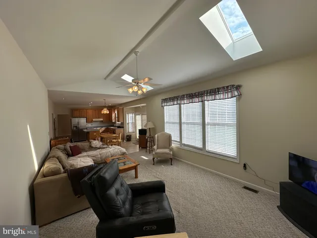 a bathroom with a tub a sink and a shower