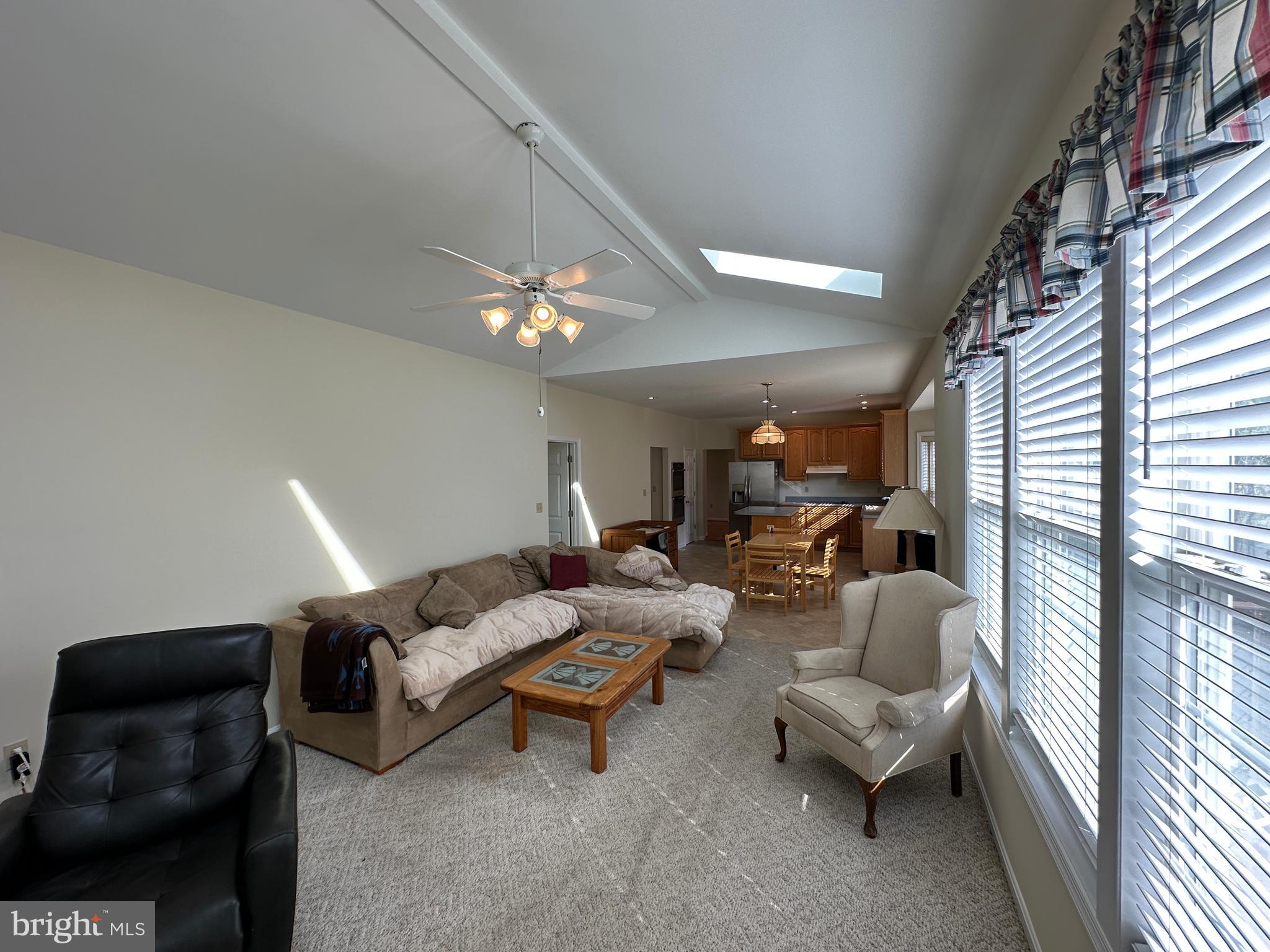 201 Vista Lane White Post, VA 22663 - Photo 40 of 61 a living room with furniture and a chandelier