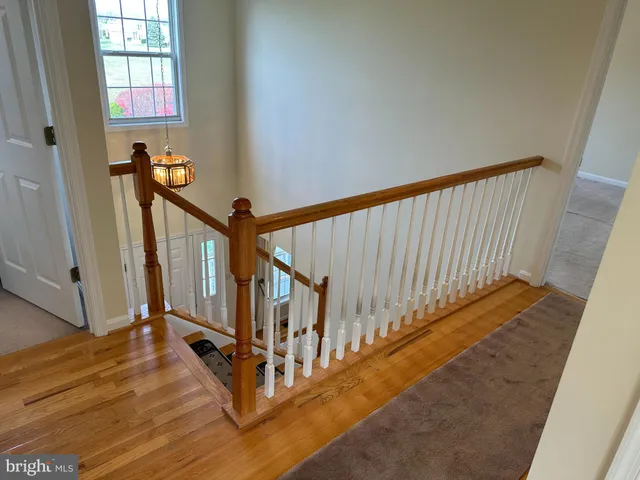 a view of empty room with a fireplace
