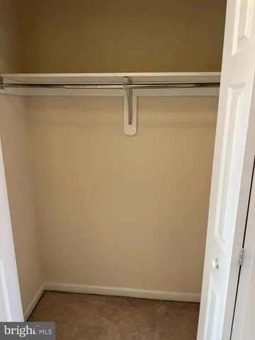 a view of water heater room with window