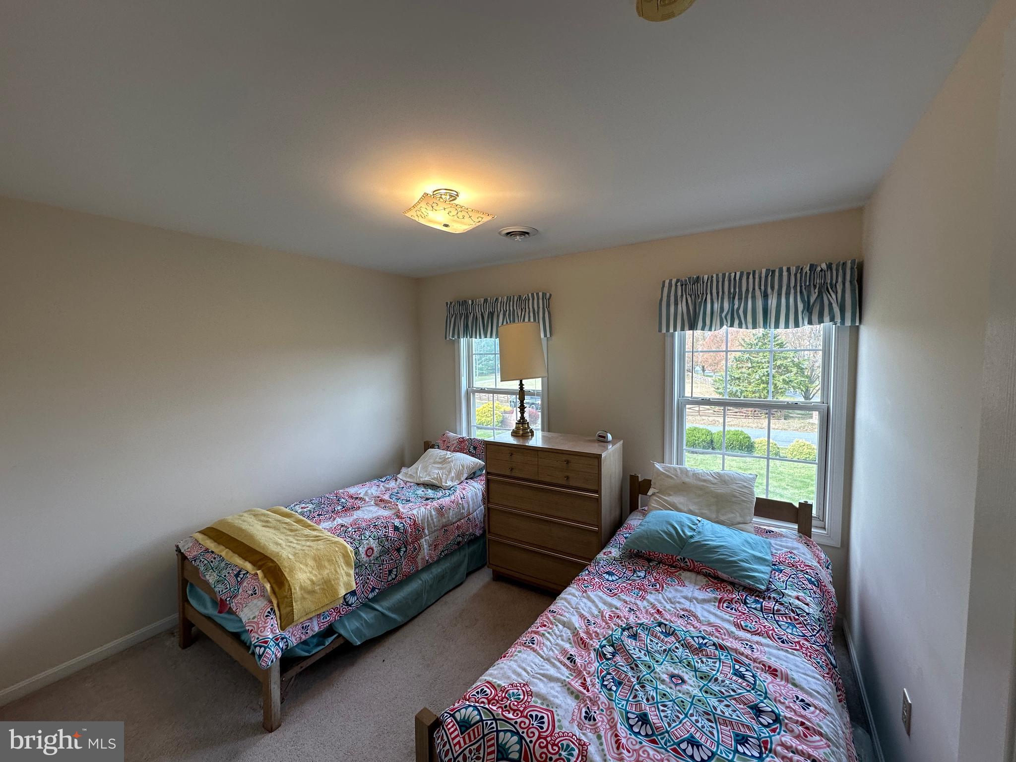 201 Vista Lane White Post, VA 22663 - Photo 50 of 61 a bedroom with two beds and window