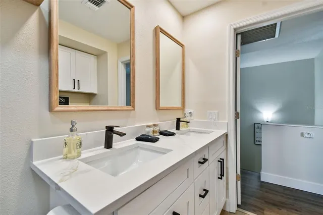 a kitchen with a stove and a sink
