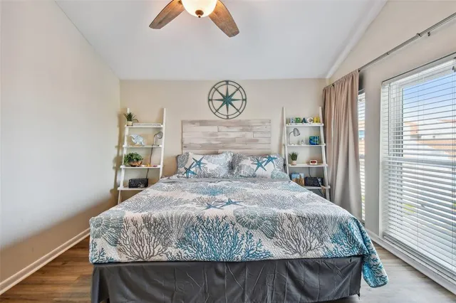 an aerial view of a house with a lake view