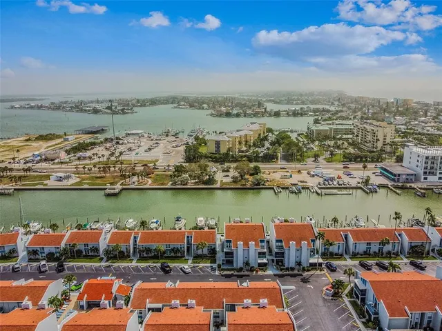an aerial view of a tennis ground and a chairs