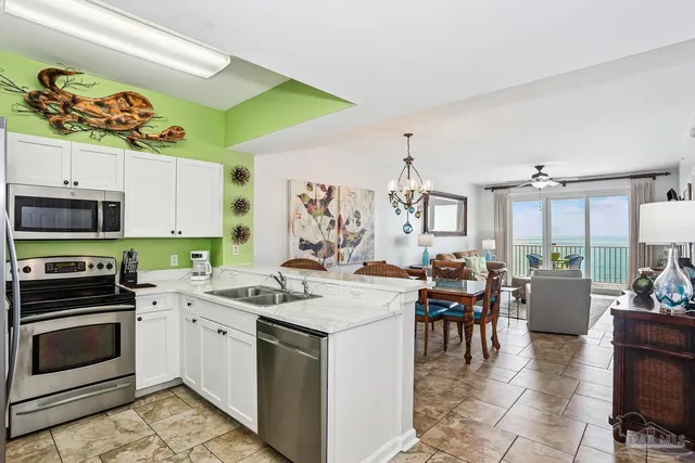 a view of a ocean with tall buildings