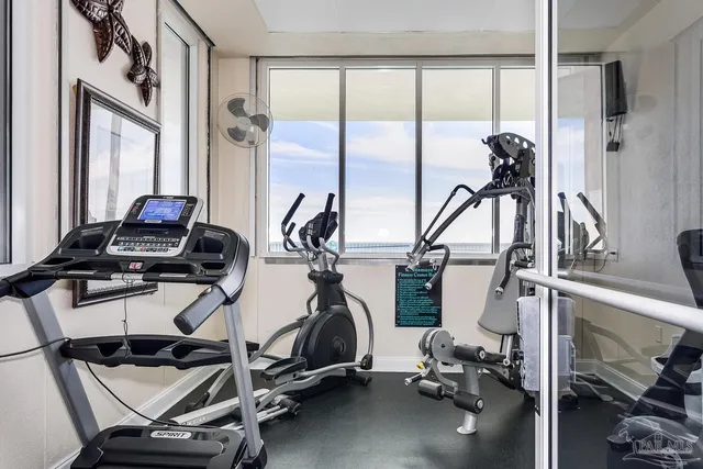 a view of a workspace with furniture