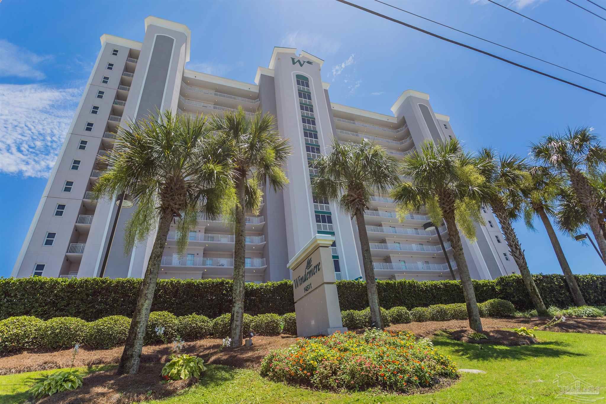 14511 Perdido Key Drive, Unit 1303 Perdido Key, FL 32507 - Photo 48 of 58 a front view of a house with garden