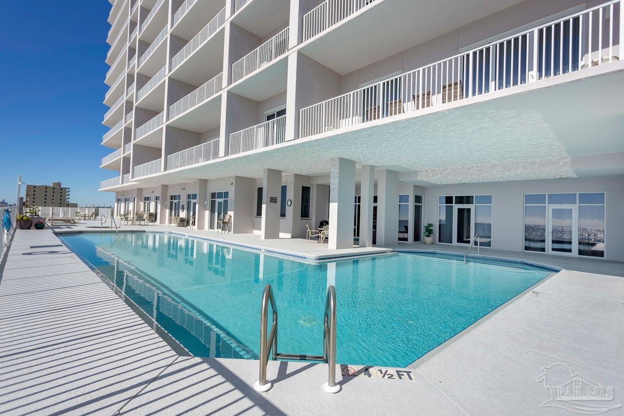 14511 Perdido Key Drive, Unit 1303 Perdido Key, FL 32507 - Photo 7 of 58 a view of a house with a swimming pool
