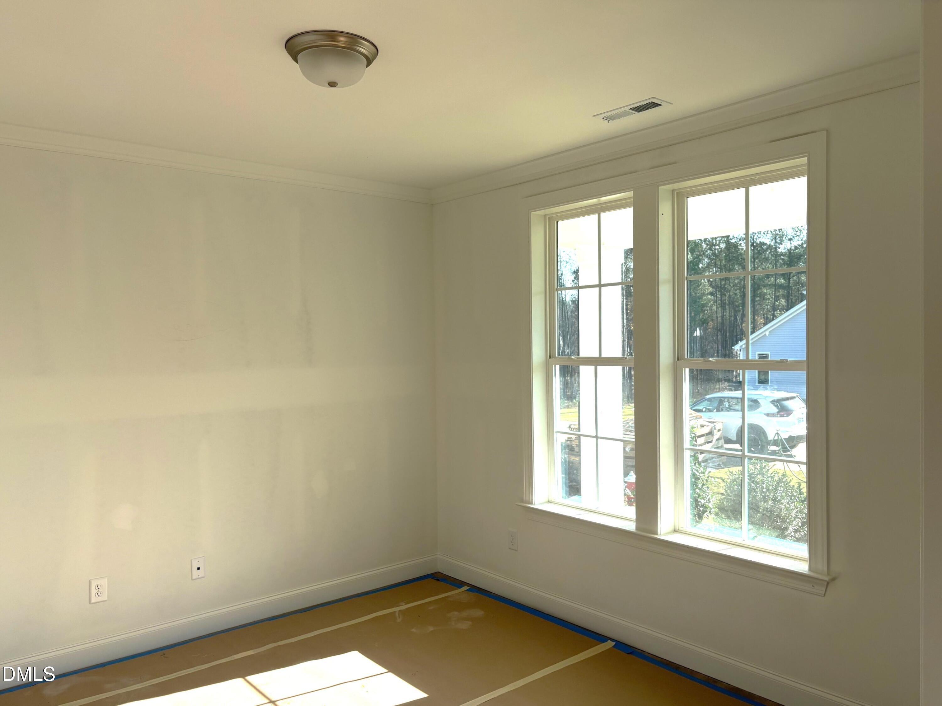 7 East Victoria Ridge Drive, Unit 16 Selma, NC 27576 - Photo 14 of 45 a view of a room with windows