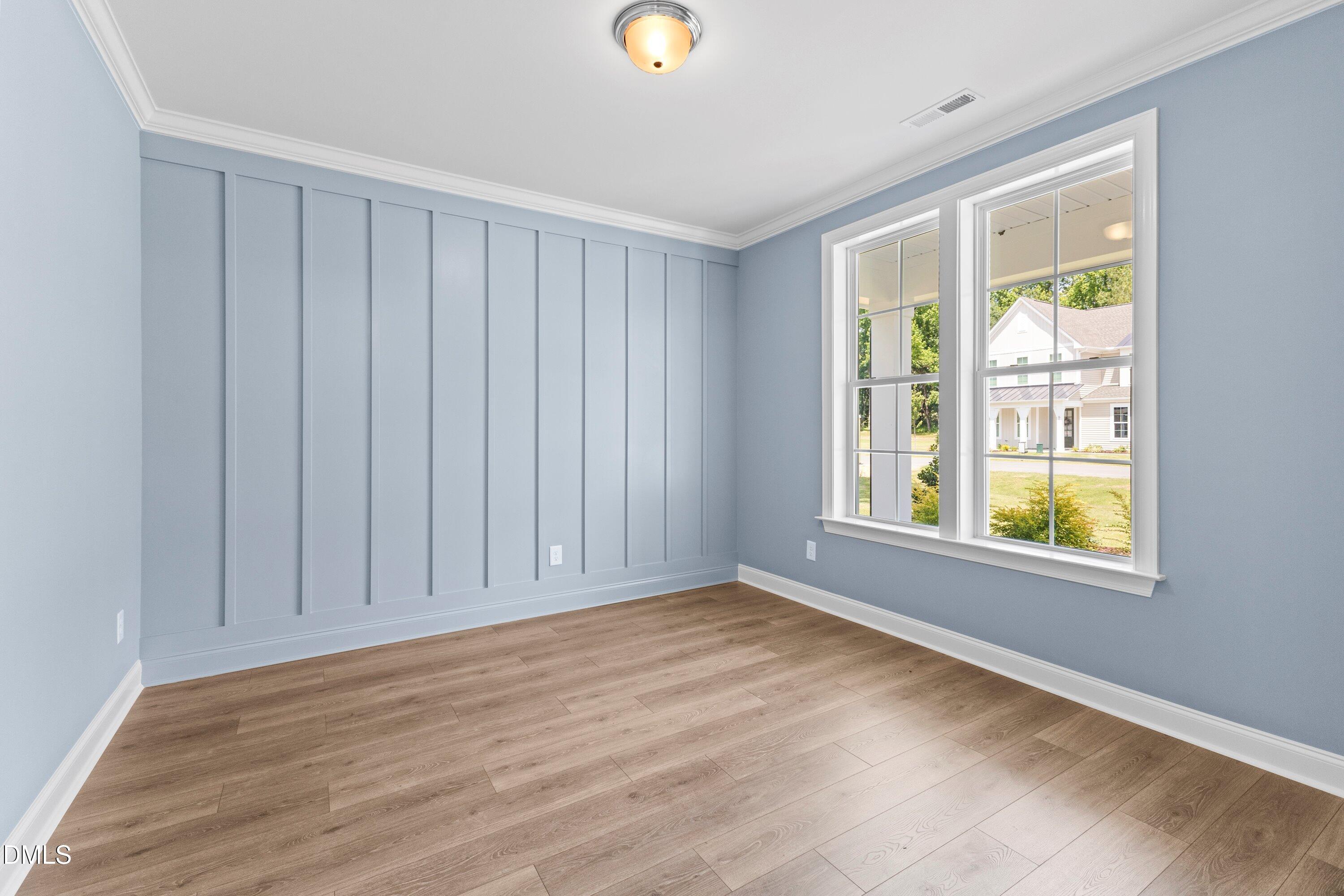 7 East Victoria Ridge Drive, Unit 16 Selma, NC 27576 - Photo 20 of 45 a view of an empty room with a window