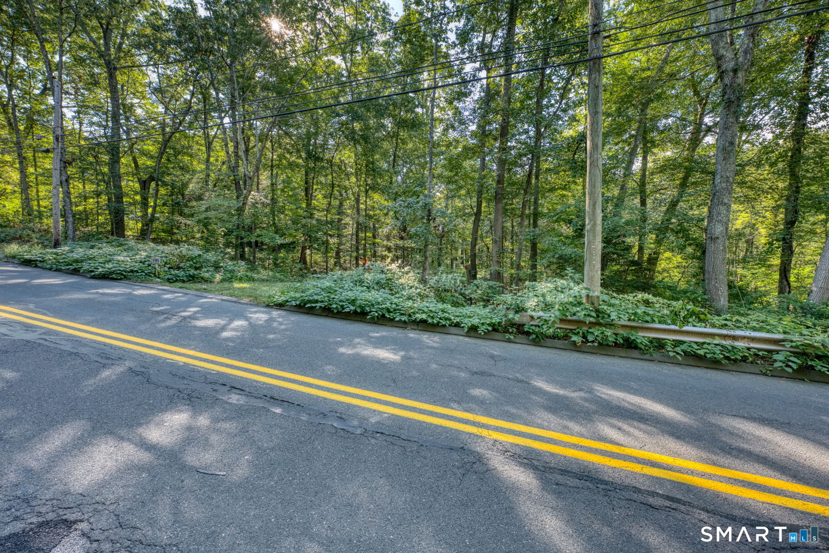 335 Old Post Road Tolland, CT 06084 - Photo 12 of 13 Road frontage providing direct access to the proeprty.