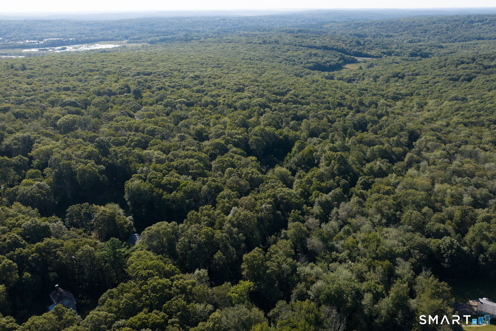 335 Old Post Road Tolland, CT 06084 - Photo 10 of 13 Long-range aerial view illustrating the surrounding landscape adn setting.
