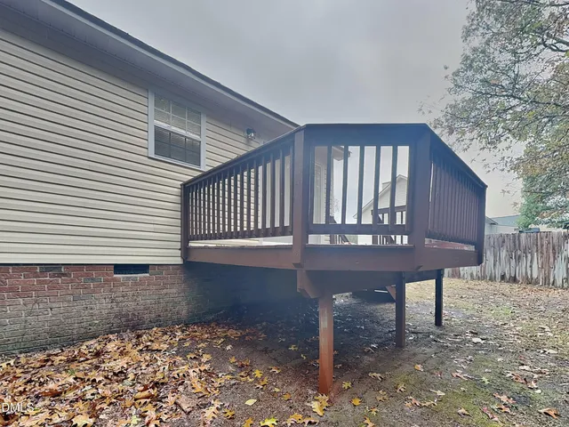 a view of a porch with a bench