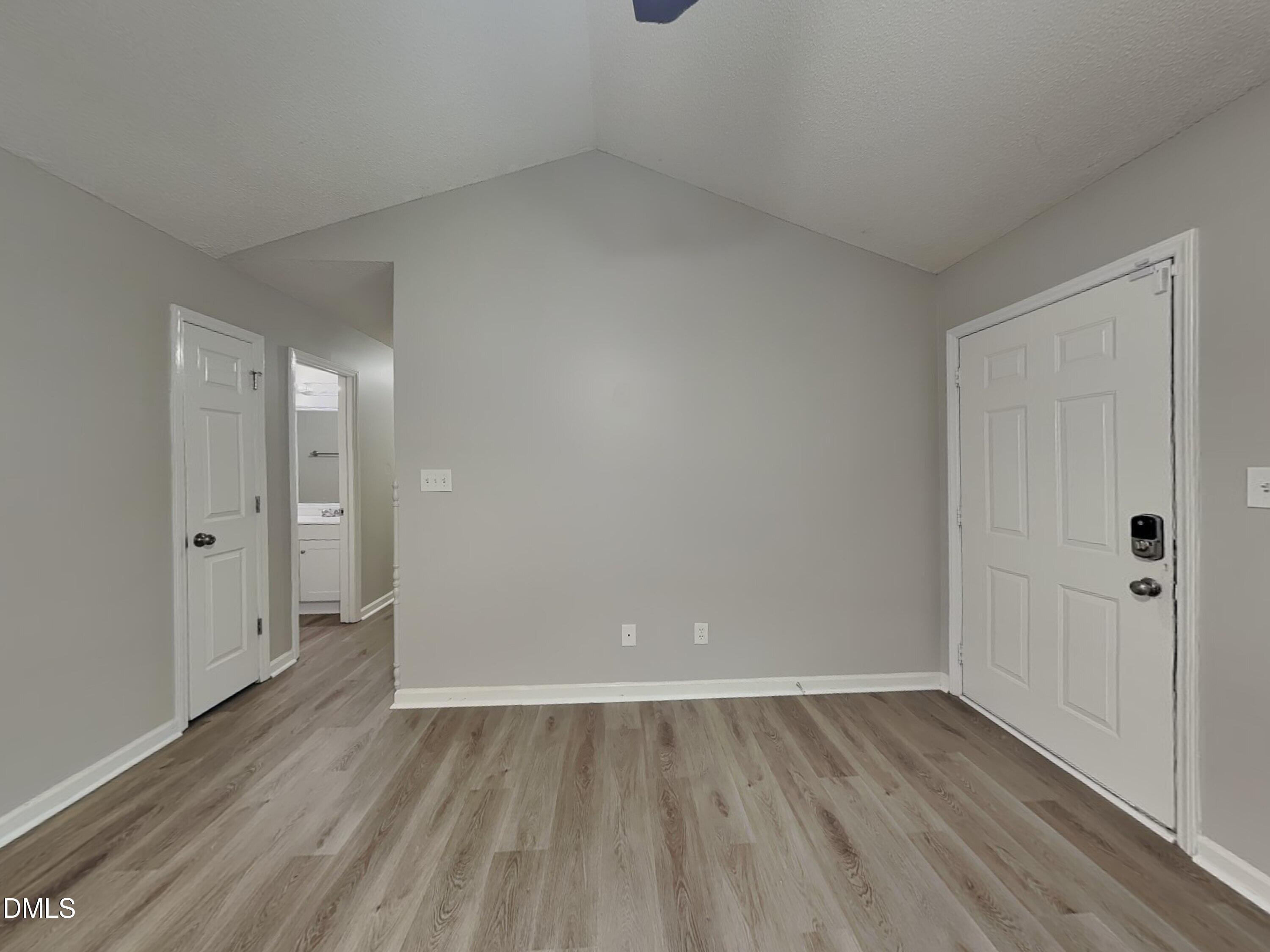 1017 Laurel Leaf Road Zebulon, NC 27597 - Photo 2 of 16 wooden floor in an empty room