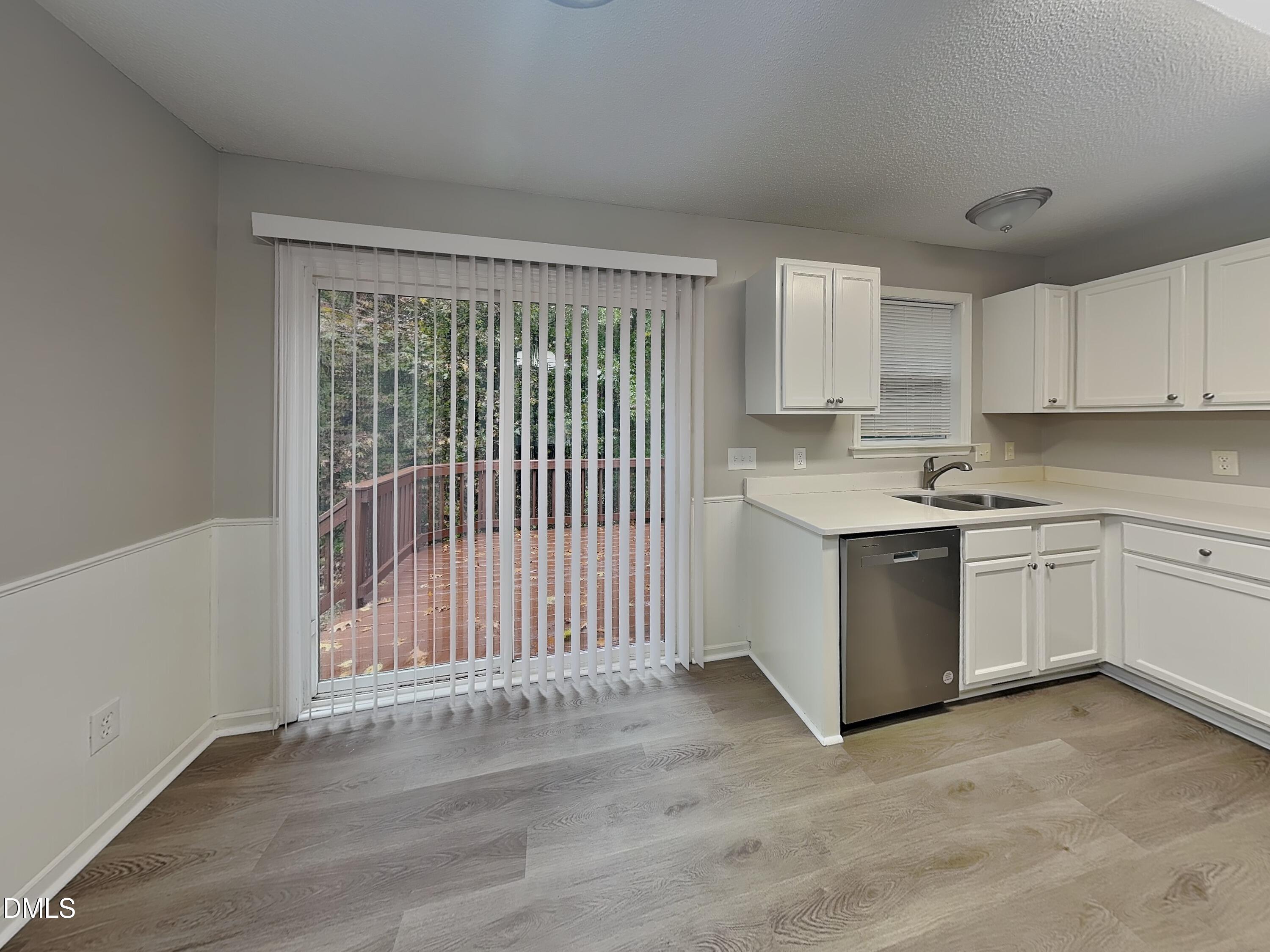 1017 Laurel Leaf Road Zebulon, NC 27597 - Photo 5 of 16 a view of a kitchen with electric appliances