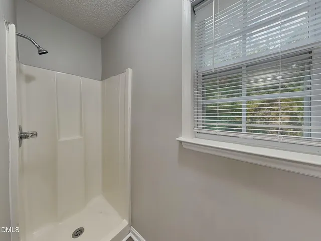 a view of a bathroom with a shower