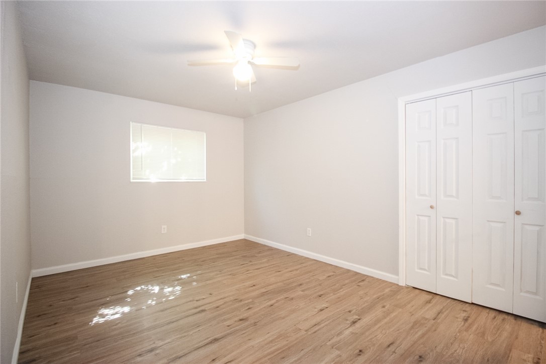 3720 Wingate Drive Waco, TX 76706 - Photo 12 of 18 a view of an empty room with wooden floor and a window