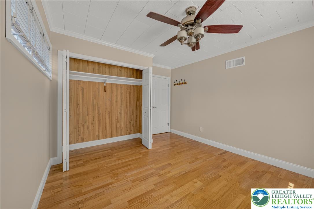 1814 Ruth Street Allentown, PA 18104 - Photo 12 of 54 Gleaming hardwood floors run throughout this comfortable bedroom space equipped with a closet.