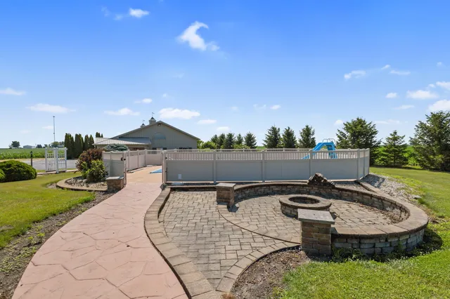a front view of a house with a yard and porch