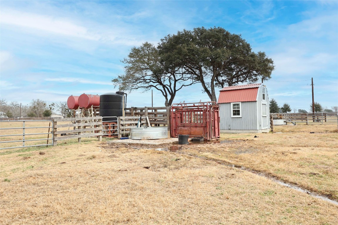 66 County Road 77D Schulenburg, TX 78956 - Photo 17 of 31 a row of houses with a yard