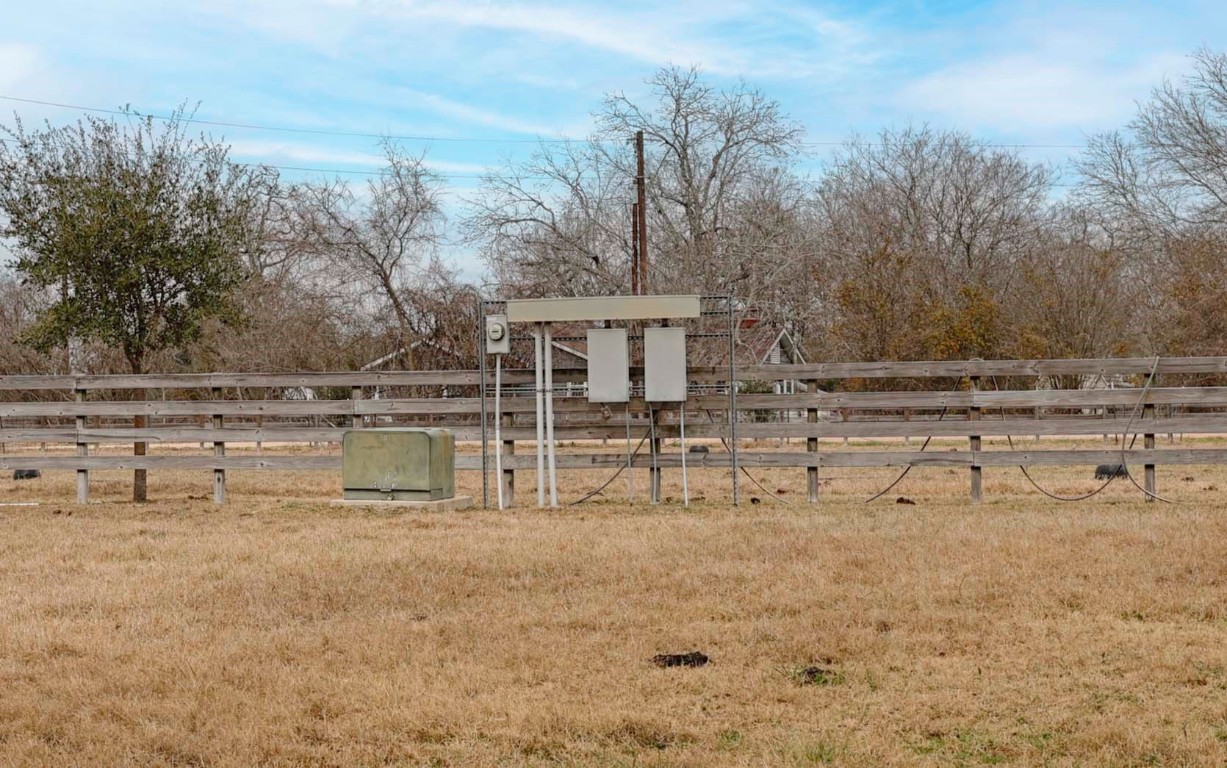 66 County Road 77D Schulenburg, TX 78956 - Photo 20 of 31 a view of house with large trees and outdoor space