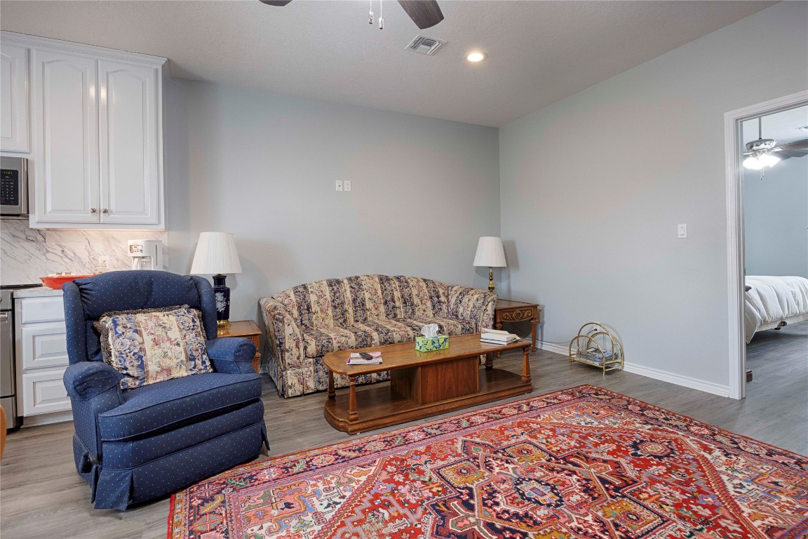 66 County Road 77D Schulenburg, TX 78956 - Photo 23 of 31 a living room with furniture and a rug