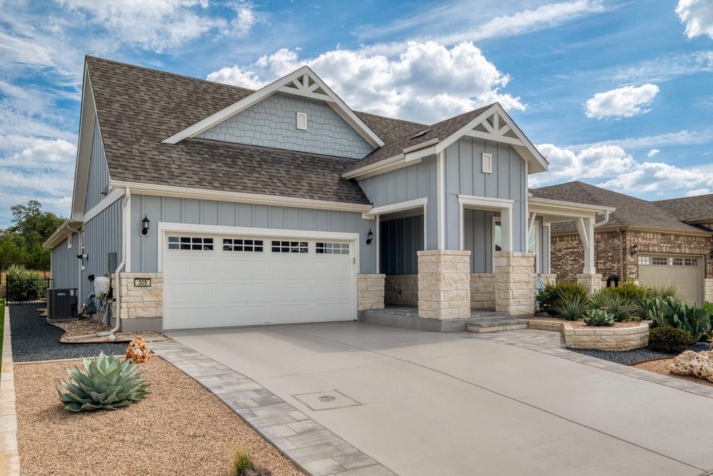 309 Kitty Hawk Road Georgetown, TX 78633 - Photo 3 of 37 a front view of a house with garage