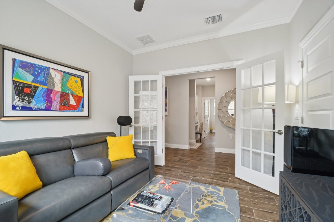 309 Kitty Hawk Road Georgetown, TX 78633 - Photo 9 of 37 a living room with furniture and a couch
