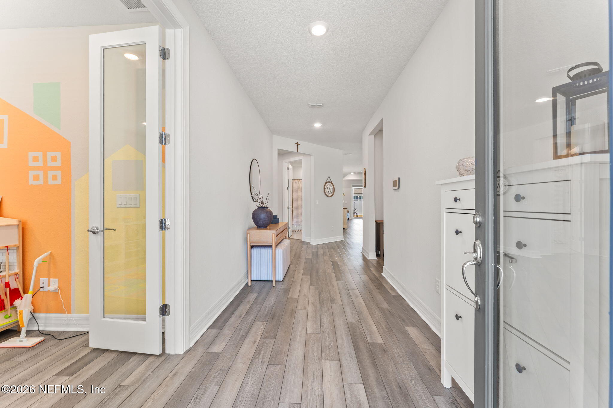 345 Muhly Grass Street Yulee, FL 32097 - Photo 23 of 42 a bathroom with a sink and a mirror