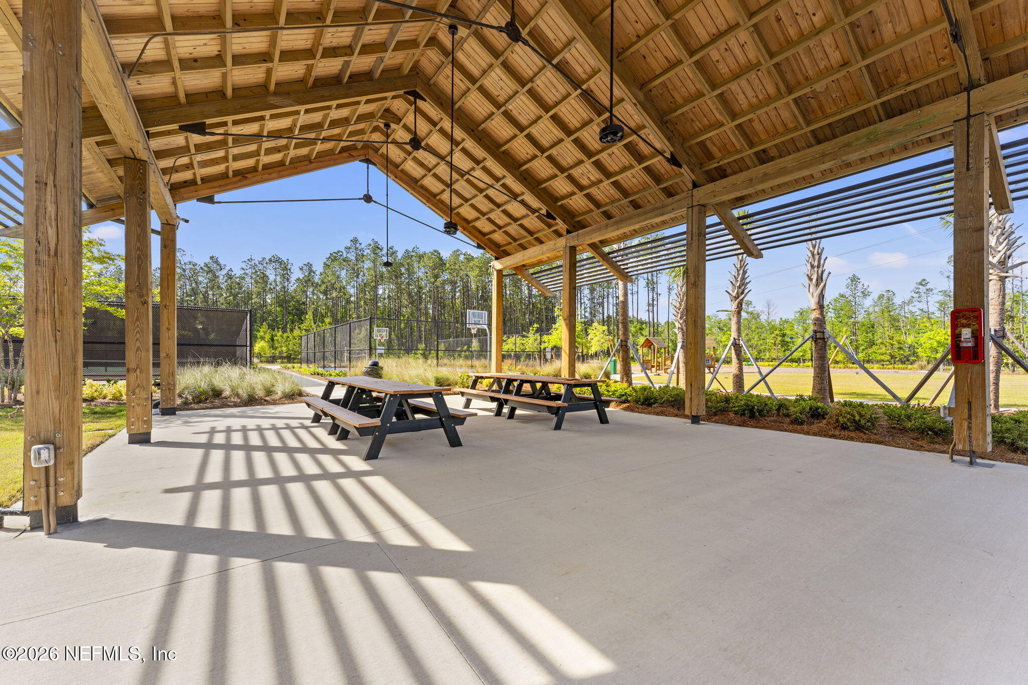 345 Muhly Grass Street Yulee, FL 32097 - Photo 33 of 42 a view of swimming pool with outdoor seating