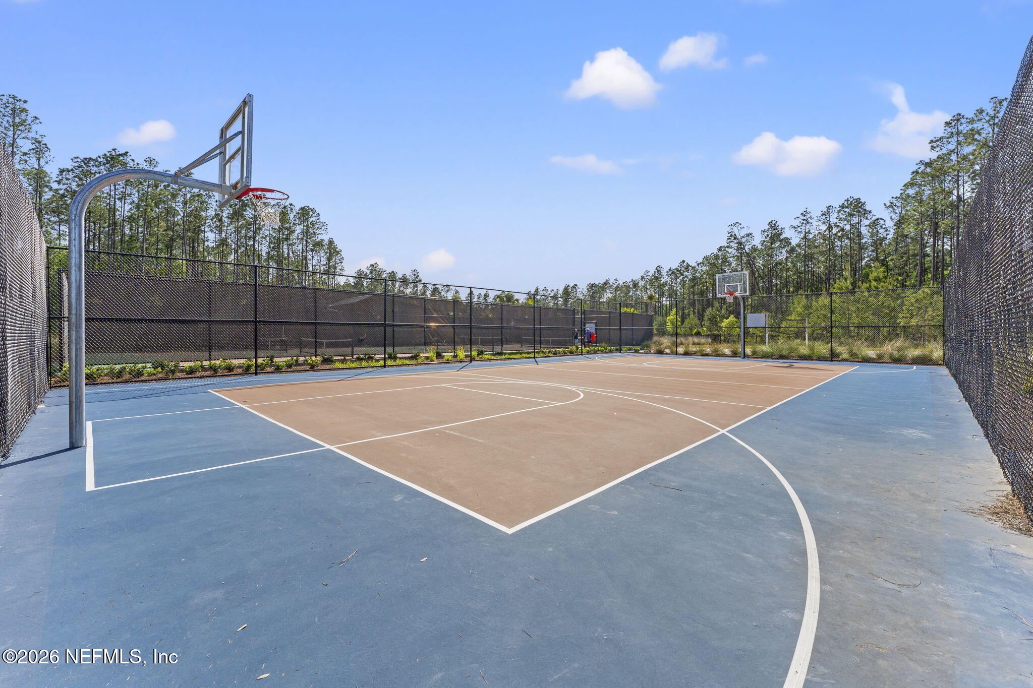 345 Muhly Grass Street Yulee, FL 32097 - Photo 37 of 42 a view of a tennis court