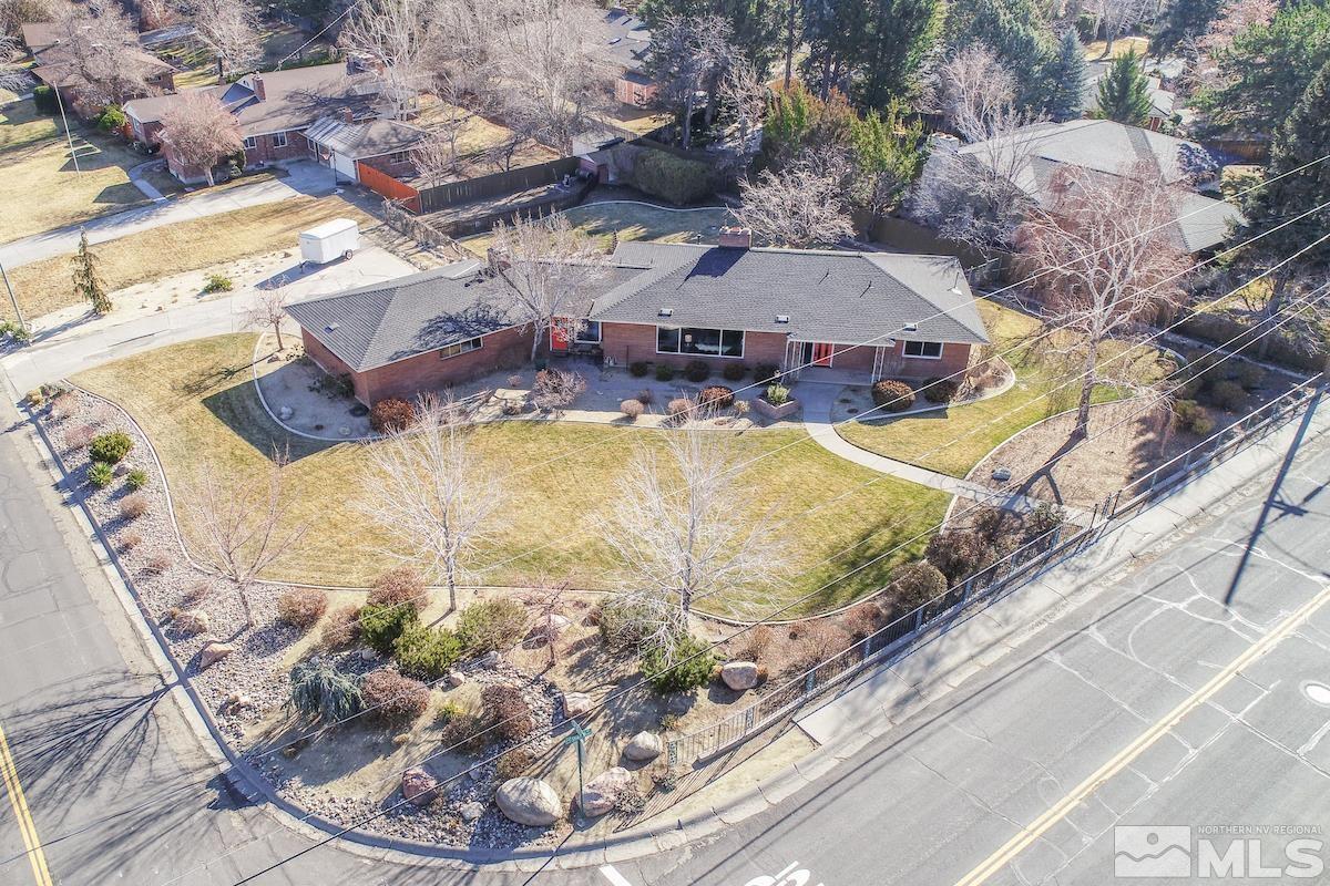 1500 Sharon Way Reno, NV 89509 - Photo 2 of 31 a view of a swimming pool with a yard