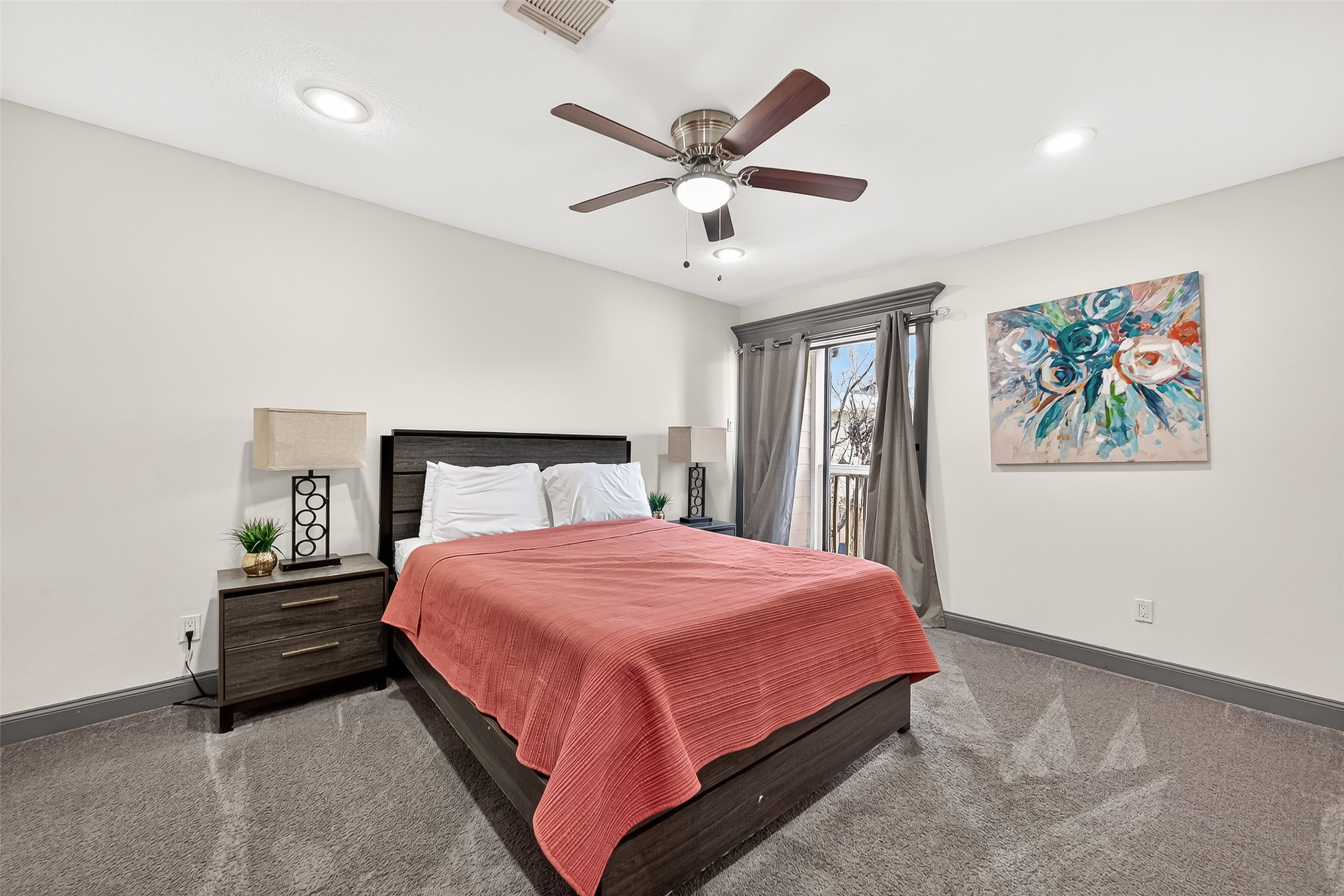 3684 Ocee Street Houston, TX 77063 - Photo 23 of 32 a bedroom with a bed and ceiling fan