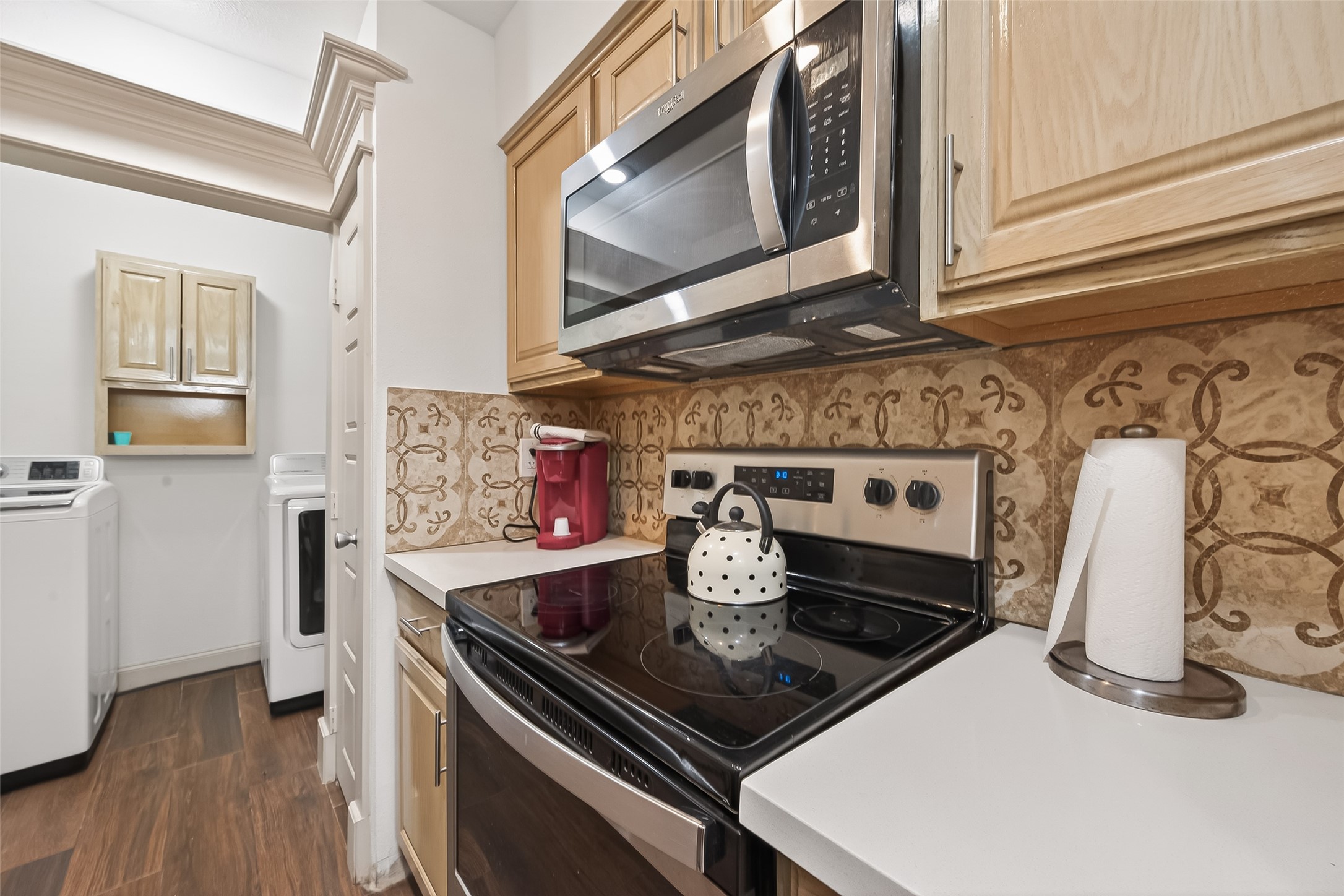 3684 Ocee Street Houston, TX 77063 - Photo 9 of 32 a stove top oven sitting inside of a kitchen