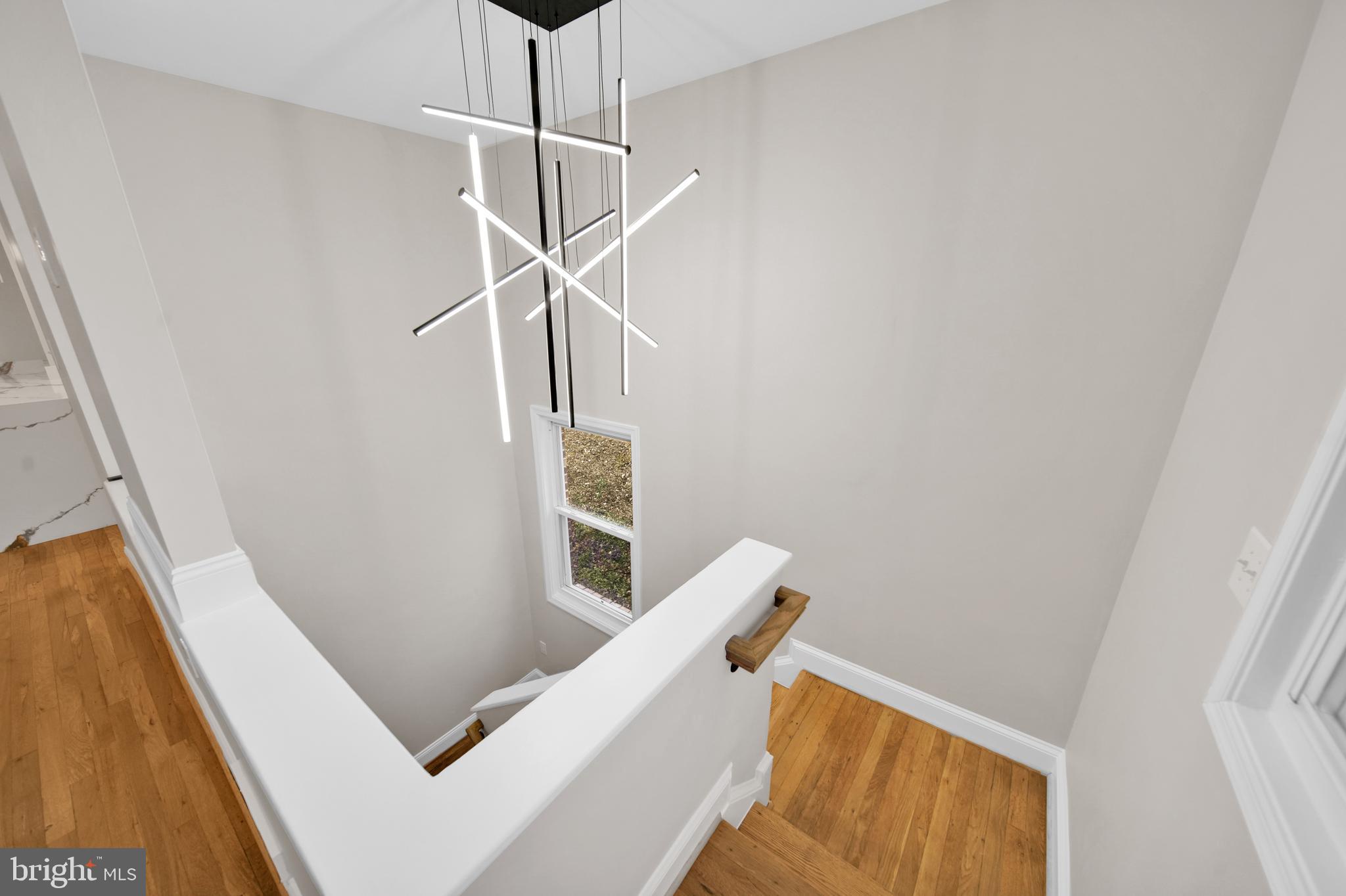 119 Victor Street Northeast, Unit 2 Washington, DC 20011 - Photo 14 of 25 a view of entryway and hall with wooden floor
