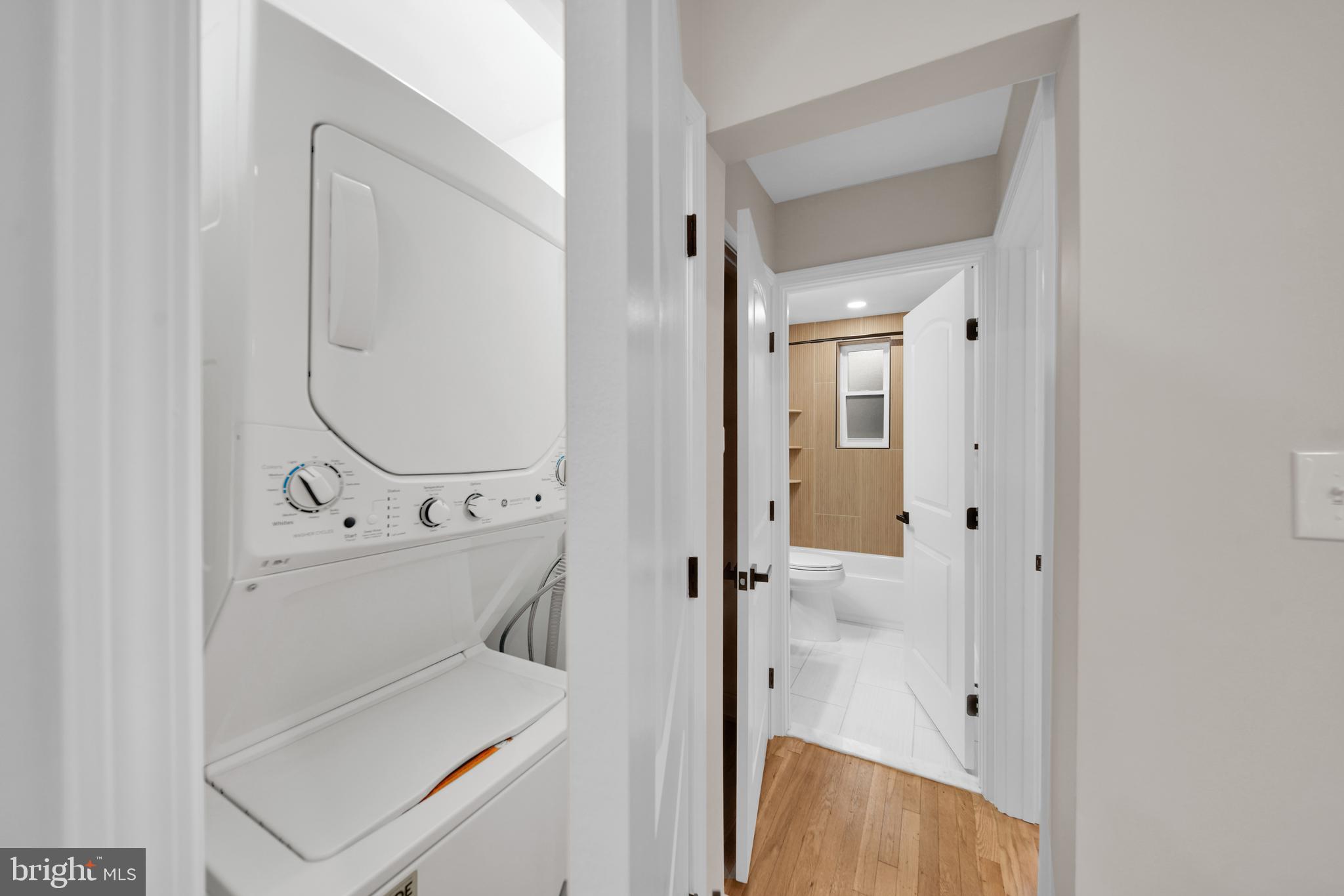 119 Victor Street Northeast, Unit 2 Washington, DC 20011 - Photo 9 of 25 a bathroom with a sink a toilet and shower