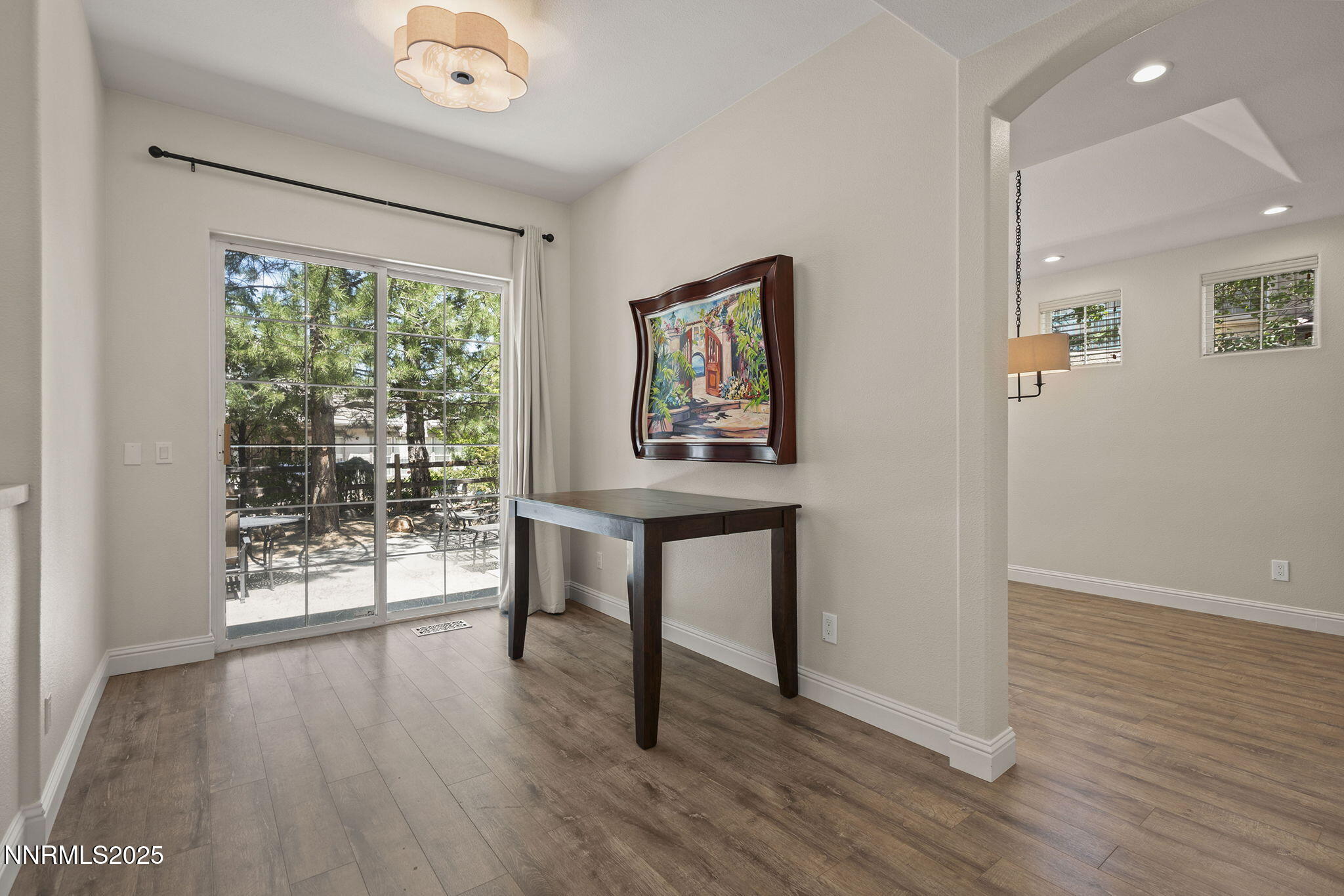 4885 Buckhaven Road Reno, NV 89519 - Photo 13 of 54 a view of a hallway with wooden floor and a window