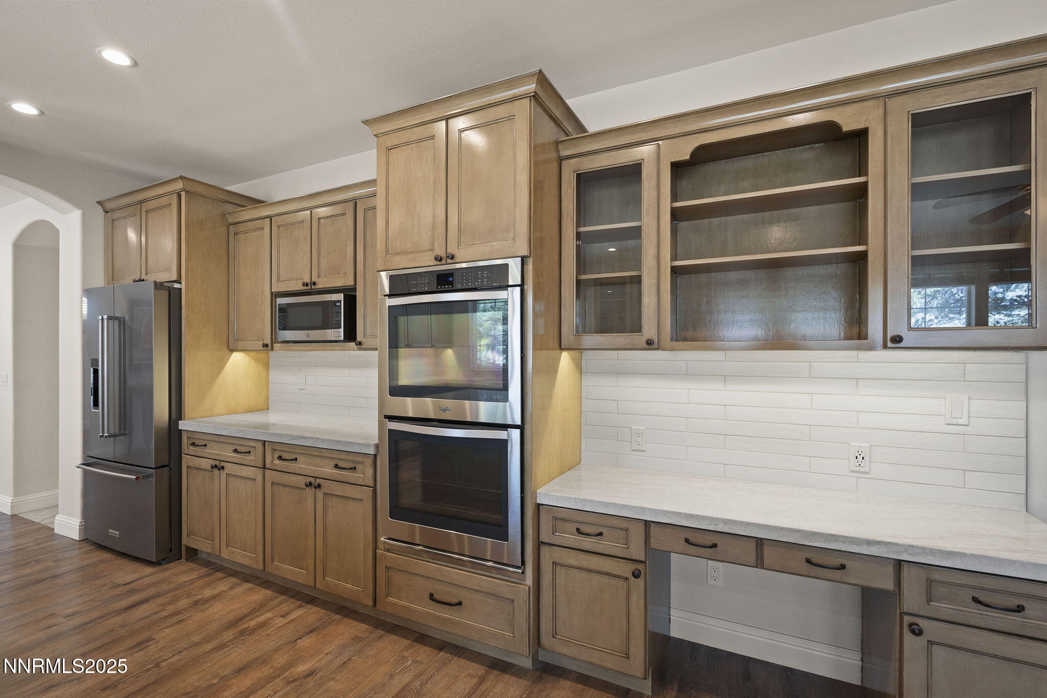 4885 Buckhaven Road Reno, NV 89519 - Photo 18 of 54 a kitchen with cabinets and stainless steel appliances