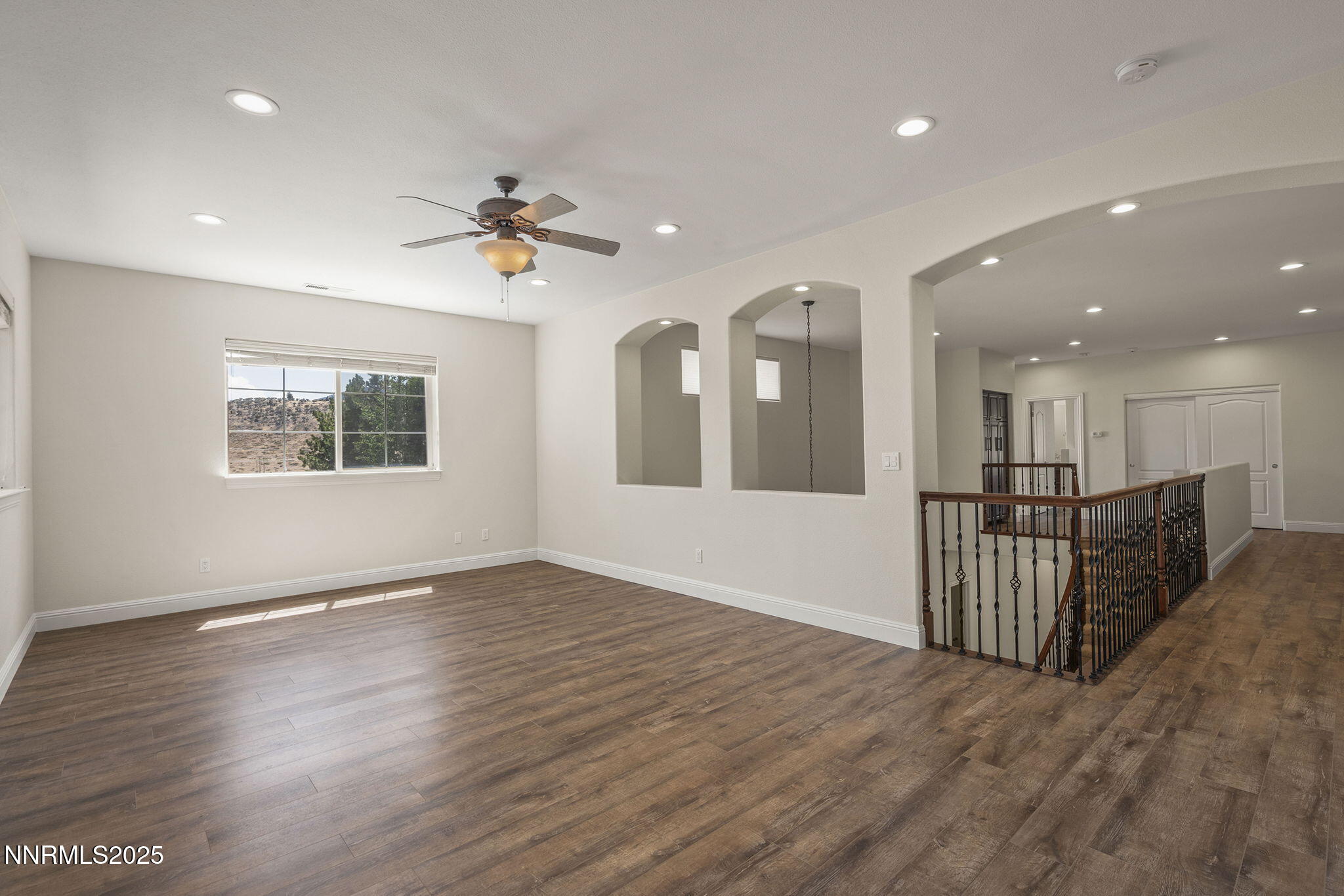 4885 Buckhaven Road Reno, NV 89519 - Photo 28 of 54 wooden floor in an empty room with a window