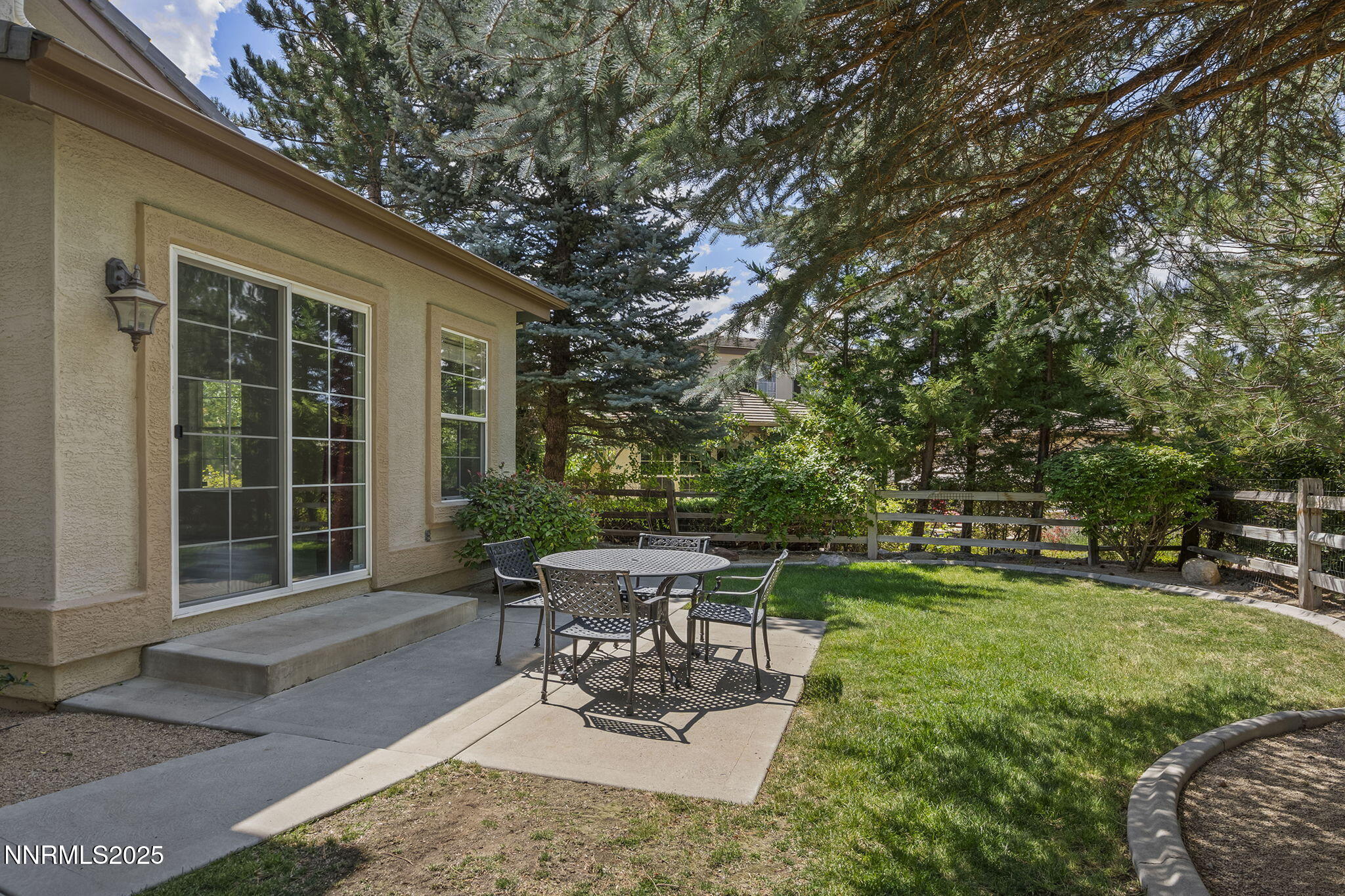 4885 Buckhaven Road Reno, NV 89519 - Photo 41 of 54 a view of a backyard with sitting area and garden