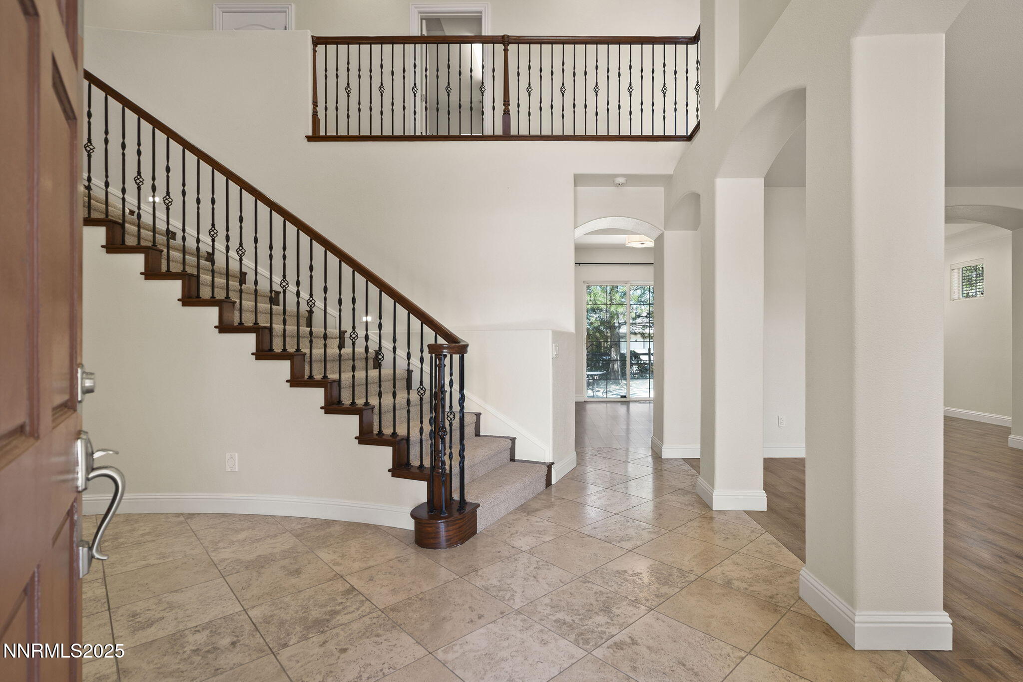 4885 Buckhaven Road Reno, NV 89519 - Photo 7 of 54 a view of staircase with wooden floor and stairs