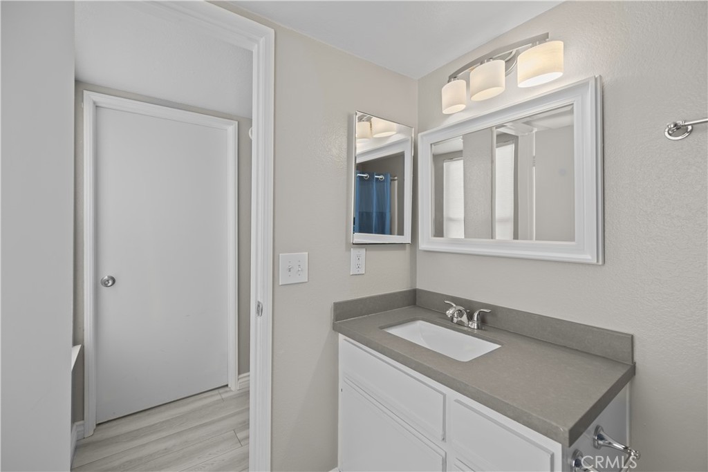 10655 Lemon Avenue, Unit 2703 Rancho Cucamonga, CA 91737 - Photo 14 of 31 a bathroom with a sink and a mirror