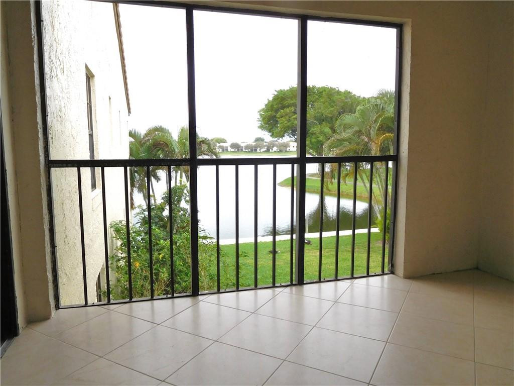2650 Greenwood Terrace, Unit G222 Boca Raton, FL 33431 - Photo 24 of 33 View of the lake from the balcony