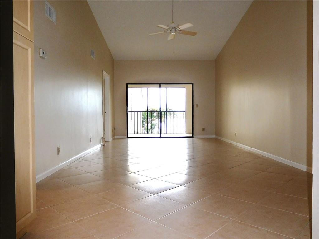 2650 Greenwood Terrace, Unit G222 Boca Raton, FL 33431 - Photo 4 of 33 Family room with vaulted ceiling