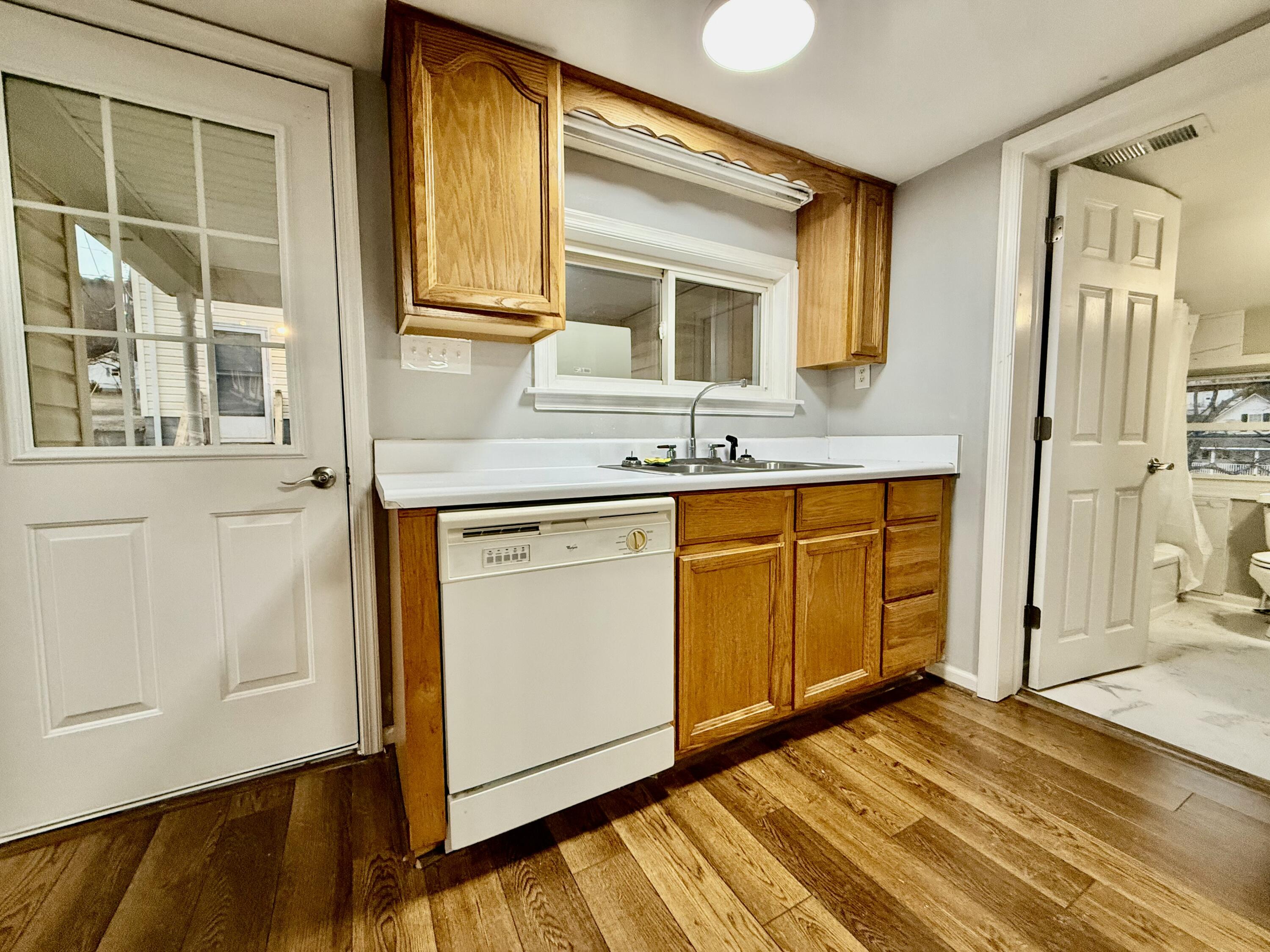 3715 Sandlewood Road Roanoke, VA 24018 - Photo 6 of 15 a bathroom with a granite countertop sink and a mirror