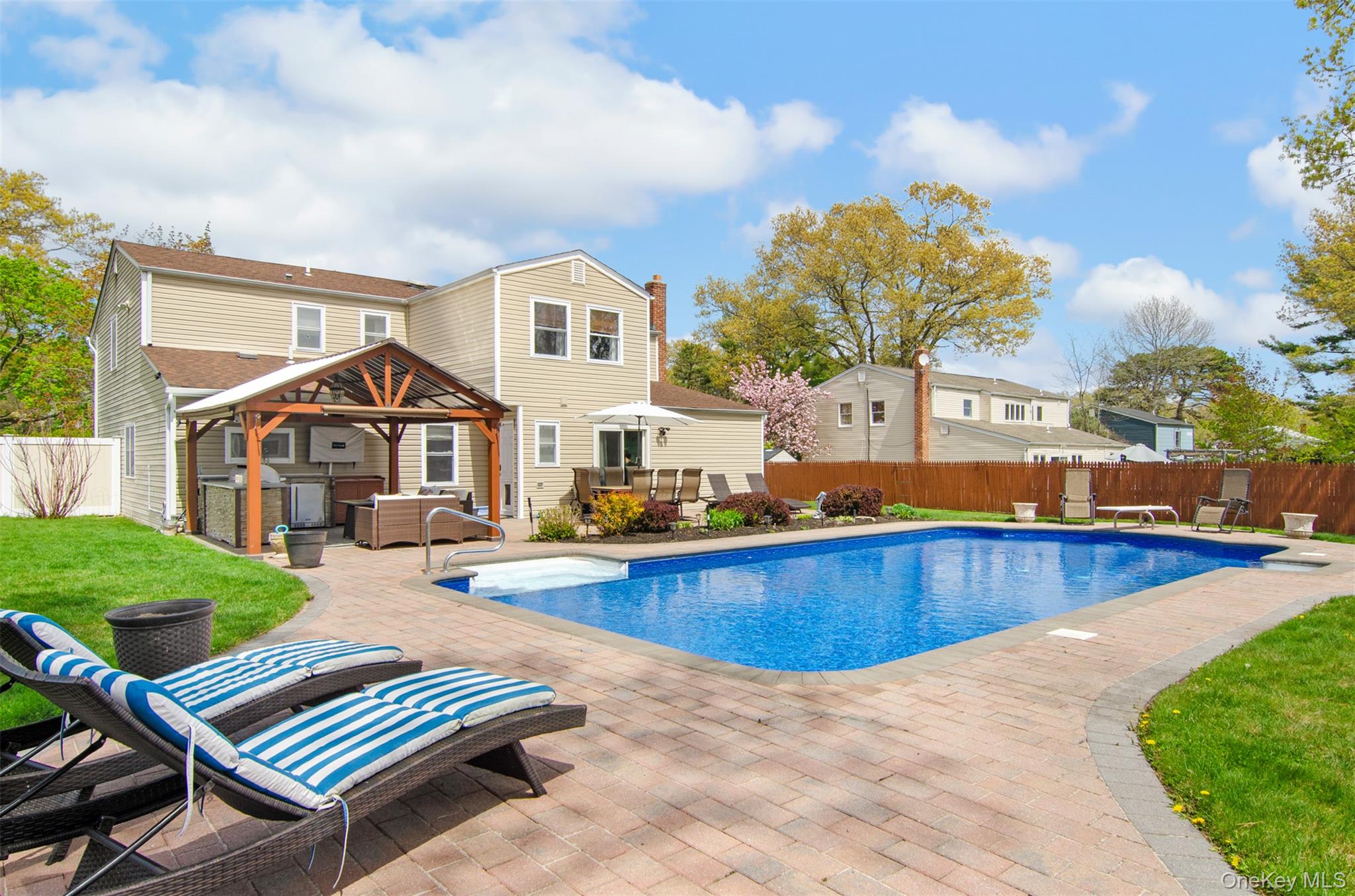 18 Calico Tree Lane Coram, NY 11727 - Photo 30 of 35 This gorgeous pool is heated and has a brand new liner.