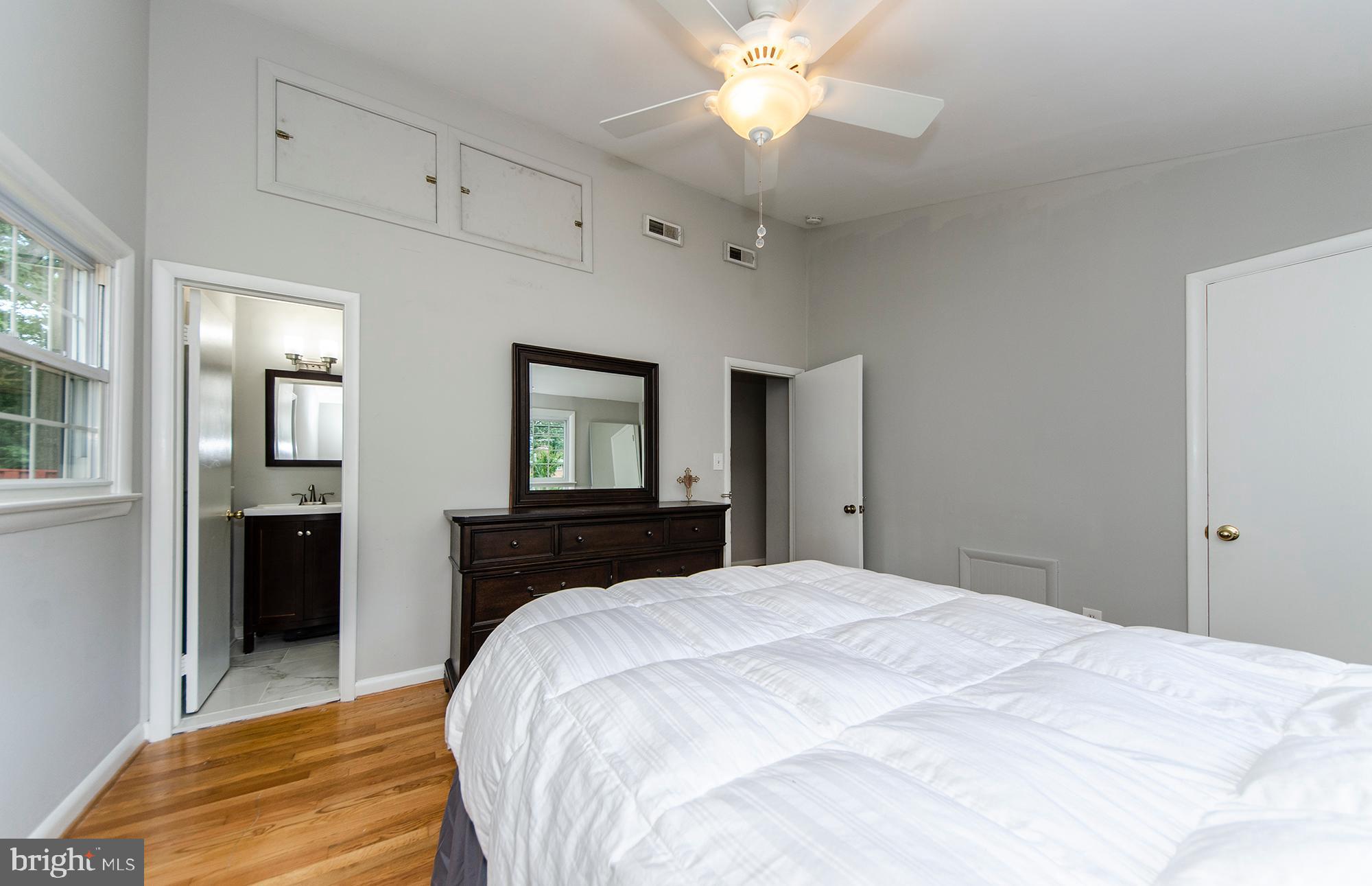 4501 Guinea Road Annandale, VA 22003 - Photo 13 of 35 Large Master bedroom with gleaming hardwood floors