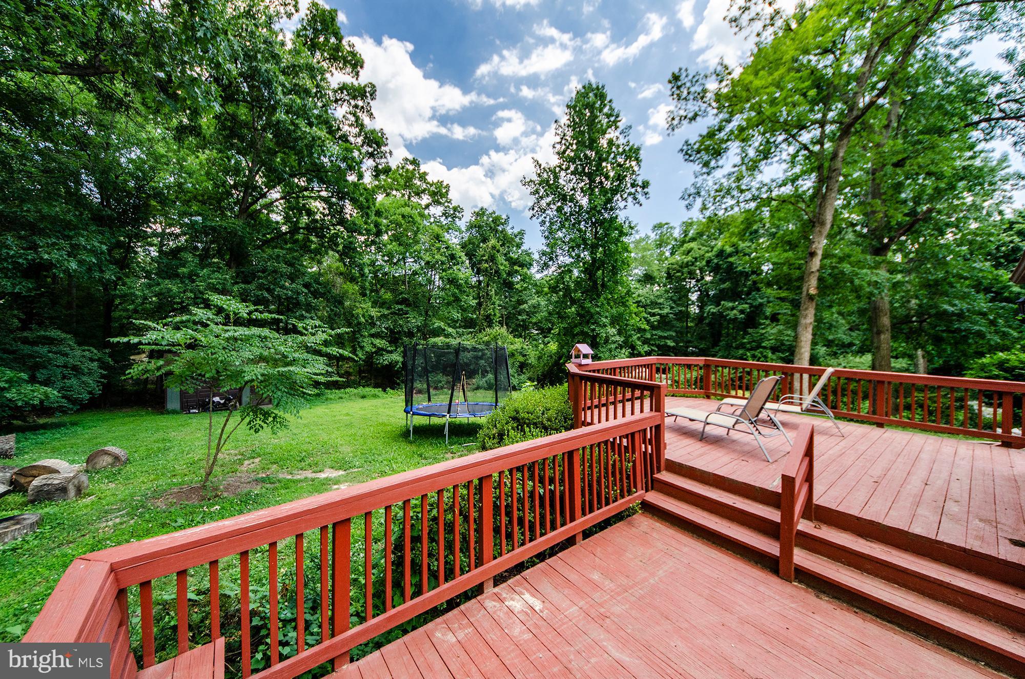 4501 Guinea Road Annandale, VA 22003 - Photo 32 of 35 Expansive backyard with huge deck